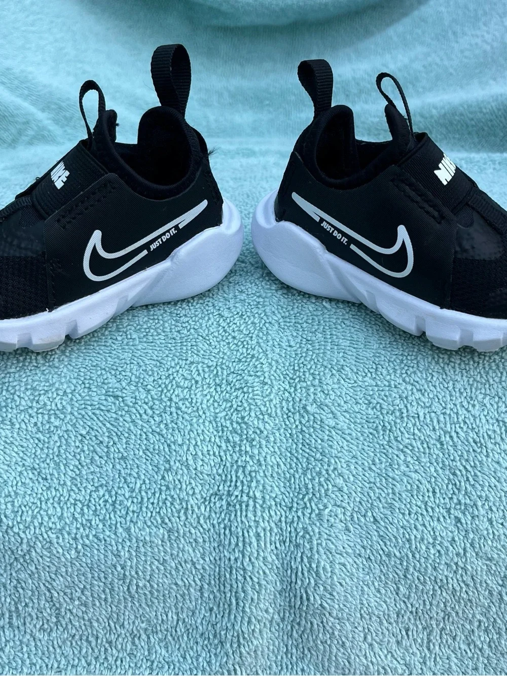 Nike Kids Black and White Slip-On Sneakers